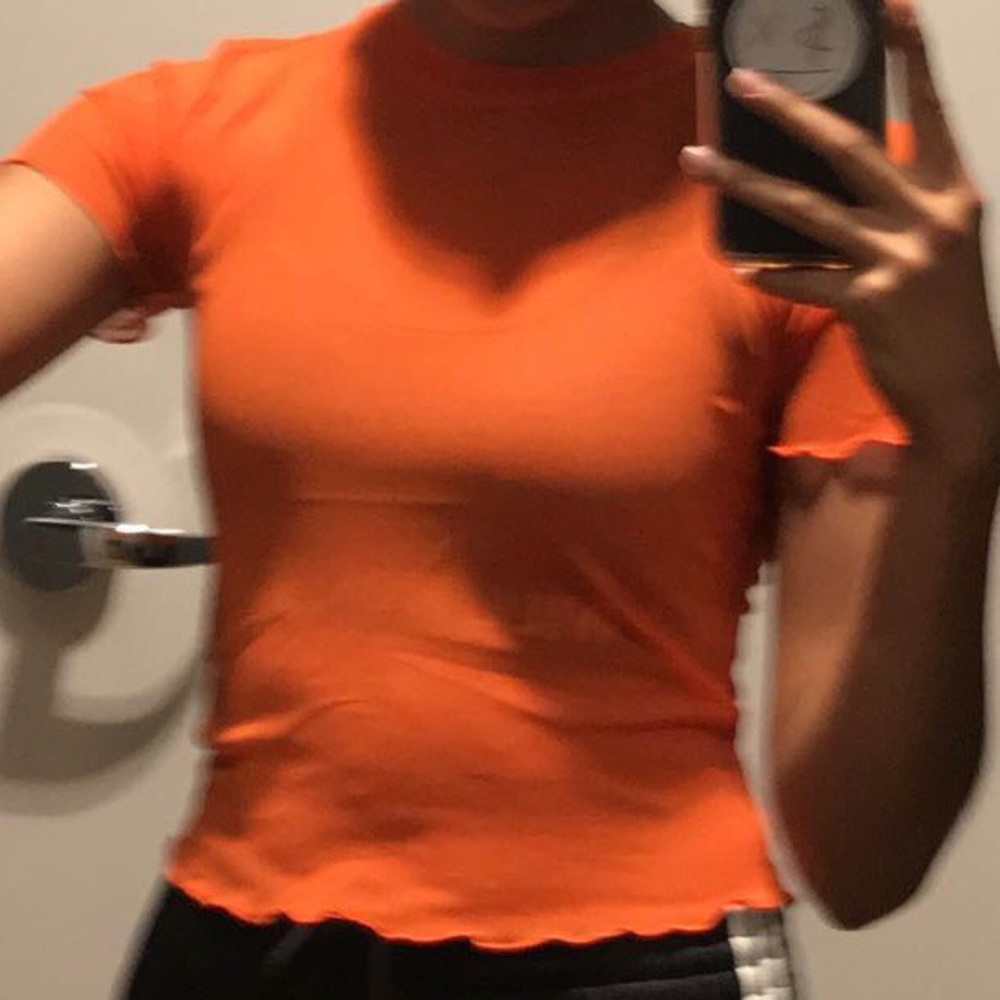 orange mesh top